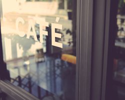 Alphabet cafe word on the window vintage color